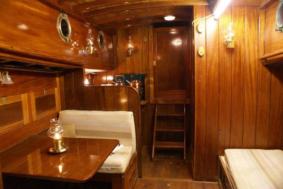 View of the main cabin looking aft towards the replacement steps up to the wheelhouse.